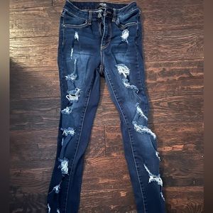 Dark wash ripped skinny jeans